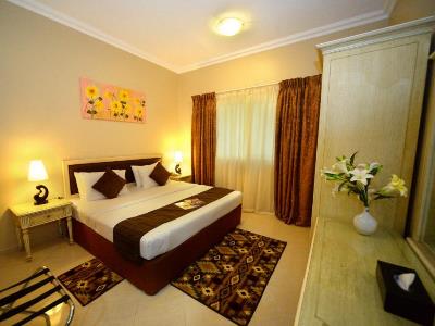 bedroom - hotel emirates stars hotel apartments sharjah - sharjah, united arab emirates