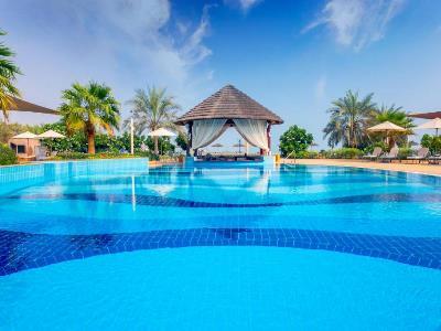 outdoor pool - hotel danat jebel dhanna resort - abu dhabi, united arab emirates