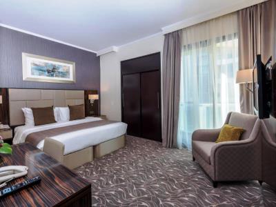 bedroom 2 - hotel hawthorn suites abu dhabi city center - abu dhabi, united arab emirates