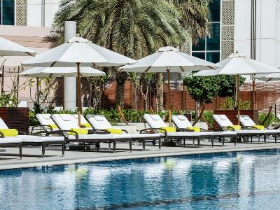 outdoor pool - hotel le royal meridien - abu dhabi, united arab emirates