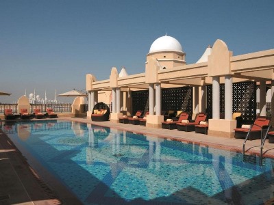 outdoor pool - hotel shangri la qaryat al beri - abu dhabi, united arab emirates