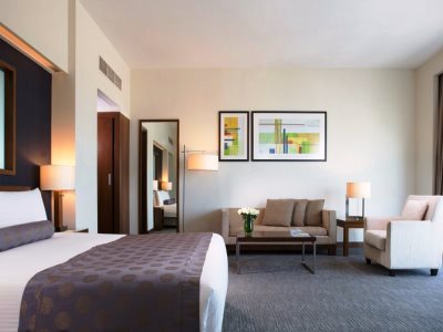 junior suite - hotel grand millennium al wahda - abu dhabi, united arab emirates