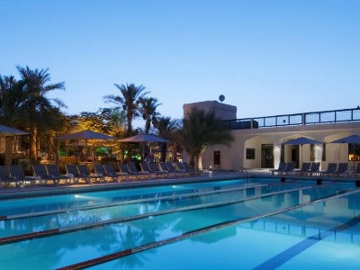 outdoor pool - hotel radisson blu al ain - al ain, united arab emirates