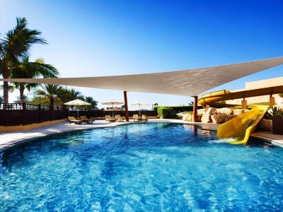 outdoor pool - hotel hilton ras al khaimah beach resort - ras al khaimah, united arab emirates