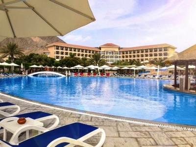 outdoor pool - hotel fujairah rotana resort and spa - fujairah, united arab emirates