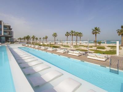 outdoor pool - hotel nikki beach resort and spa - dubai, united arab emirates