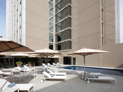 outdoor pool - hotel rove city centre - dubai, united arab emirates