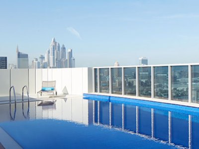 outdoor pool - hotel dusitd2 kenz - dubai, united arab emirates