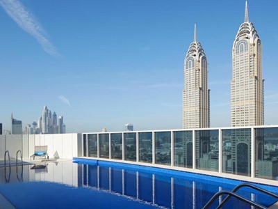 outdoor pool - hotel dusitd2 kenz - dubai, united arab emirates