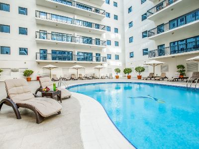 outdoor pool - hotel golden sands 10 - dubai, united arab emirates