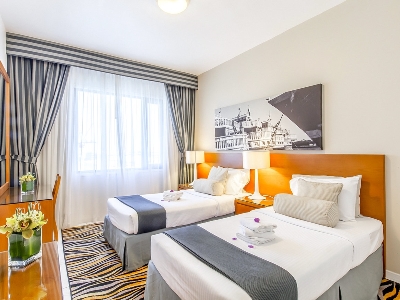 bedroom - hotel golden sands 10 - dubai, united arab emirates