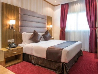 bedroom - hotel royal tulip - dubai, united arab emirates