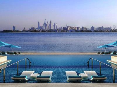outdoor pool - hotel retreat palm dubai mgallery by sofitel - dubai, united arab emirates