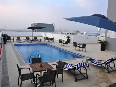 outdoor pool - hotel fortune park - dubai, united arab emirates