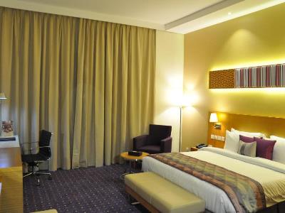 bedroom - hotel fortune park - dubai, united arab emirates