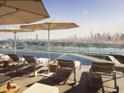 outdoor pool - hotel al bandar rotana - creek - dubai, united arab emirates