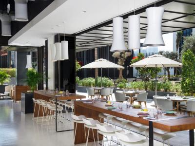 restaurant - hotel la ville htl and suites city walk - dubai, united arab emirates