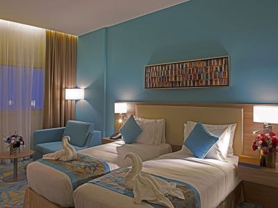 bedroom - hotel mena plaza hotel al barsha - dubai, united arab emirates