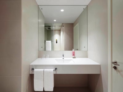bathroom - hotel rove dubai marina - dubai, united arab emirates