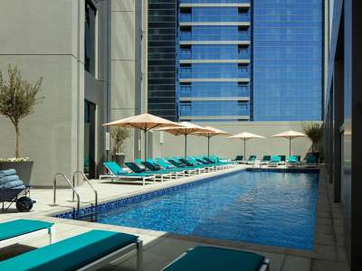 outdoor pool - hotel rove dubai marina - dubai, united arab emirates