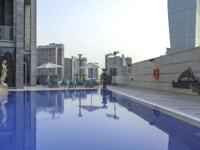 outdoor pool - hotel grand millennium business bay - dubai, united arab emirates