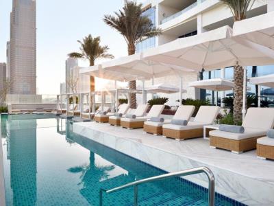 outdoor pool - hotel grand plaza movenpick media city - dubai, united arab emirates