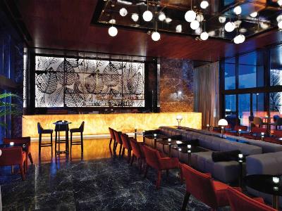 bar - hotel grand plaza movenpick media city - dubai, united arab emirates
