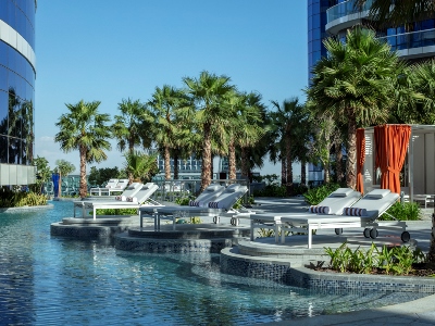 outdoor pool 1 - hotel paramount hotel dubai - dubai, united arab emirates