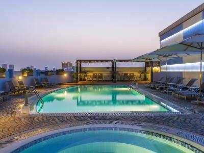 outdoor pool - hotel coral dubai deira - dubai, united arab emirates