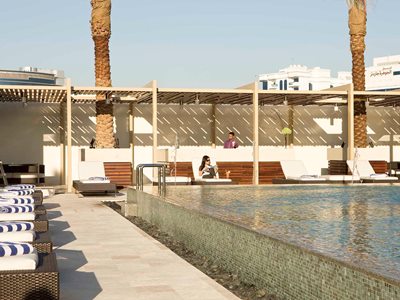 outdoor pool - hotel novotel deira city centre - dubai, united arab emirates