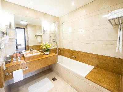 bathroom - hotel grand millennium dubai - dubai, united arab emirates