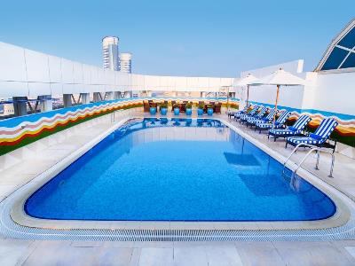 outdoor pool - hotel grand excelsior bur dubai - dubai, united arab emirates