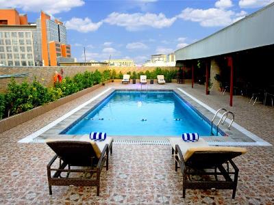 outdoor pool - hotel vision imperial - dubai, united arab emirates