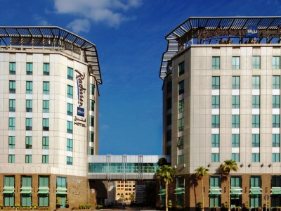 exterior view - hotel radisson blu dubai media city - dubai, united arab emirates