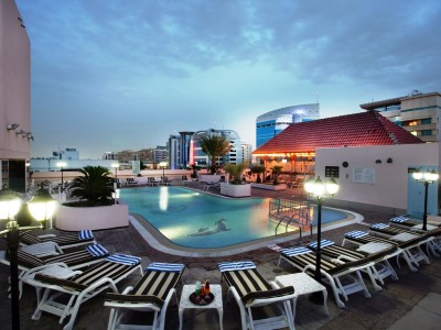 outdoor pool - hotel carlton palace - dubai, united arab emirates