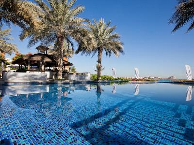 outdoor pool 1 - hotel oaks ibn battuta gate dubai - dubai, united arab emirates