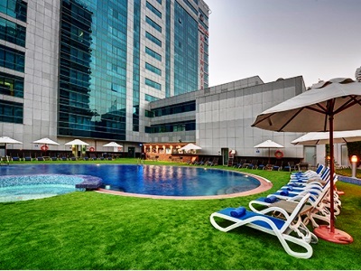outdoor pool - hotel marina view hotel apartments - dubai, united arab emirates