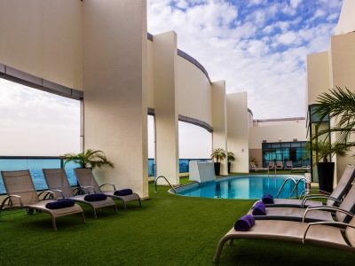 outdoor pool - hotel first central hotel suites - dubai, united arab emirates