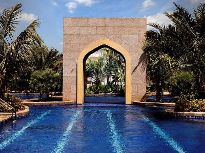 outdoor pool - hotel conrad dubai - dubai, united arab emirates