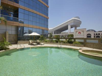 outdoor pool - hotel doubletree by hilton al barsha - dubai, united arab emirates