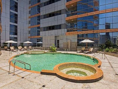 outdoor pool - hotel doubletree by hilton al barsha - dubai, united arab emirates
