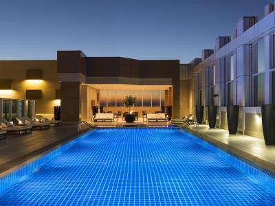 outdoor pool - hotel sheraton grand hotel dubai - dubai, united arab emirates