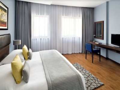 bedroom - hotel movenpick htl apt al mamzar - dubai, united arab emirates