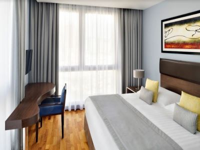 bedroom 1 - hotel movenpick htl apt al mamzar - dubai, united arab emirates