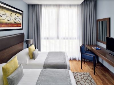bedroom 2 - hotel movenpick htl apt al mamzar - dubai, united arab emirates