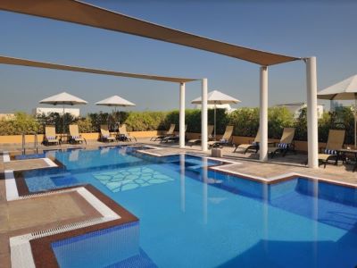 outdoor pool - hotel movenpick htl apt al mamzar - dubai, united arab emirates