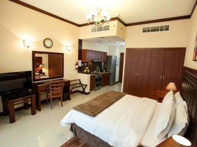 bedroom - hotel xclusive maples hotel apartments - dubai, united arab emirates
