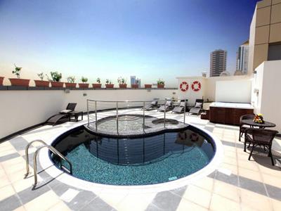 outdoor pool - hotel xclusive maples hotel apartments - dubai, united arab emirates