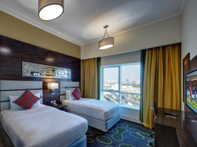 bedroom 1 - hotel ghaya grand - dubai, united arab emirates
