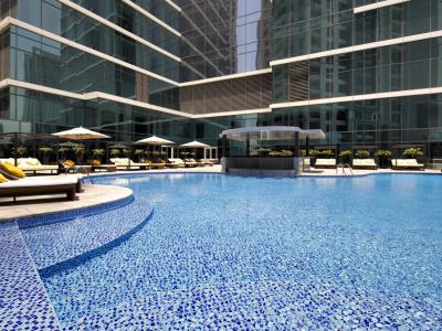 outdoor pool - hotel taj dubai - dubai, united arab emirates